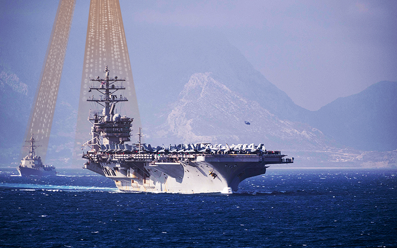 A picture of a ship at sea with an antenna receiving a signal from a satellite.