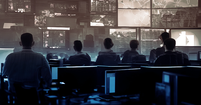 People sitting in mission control room